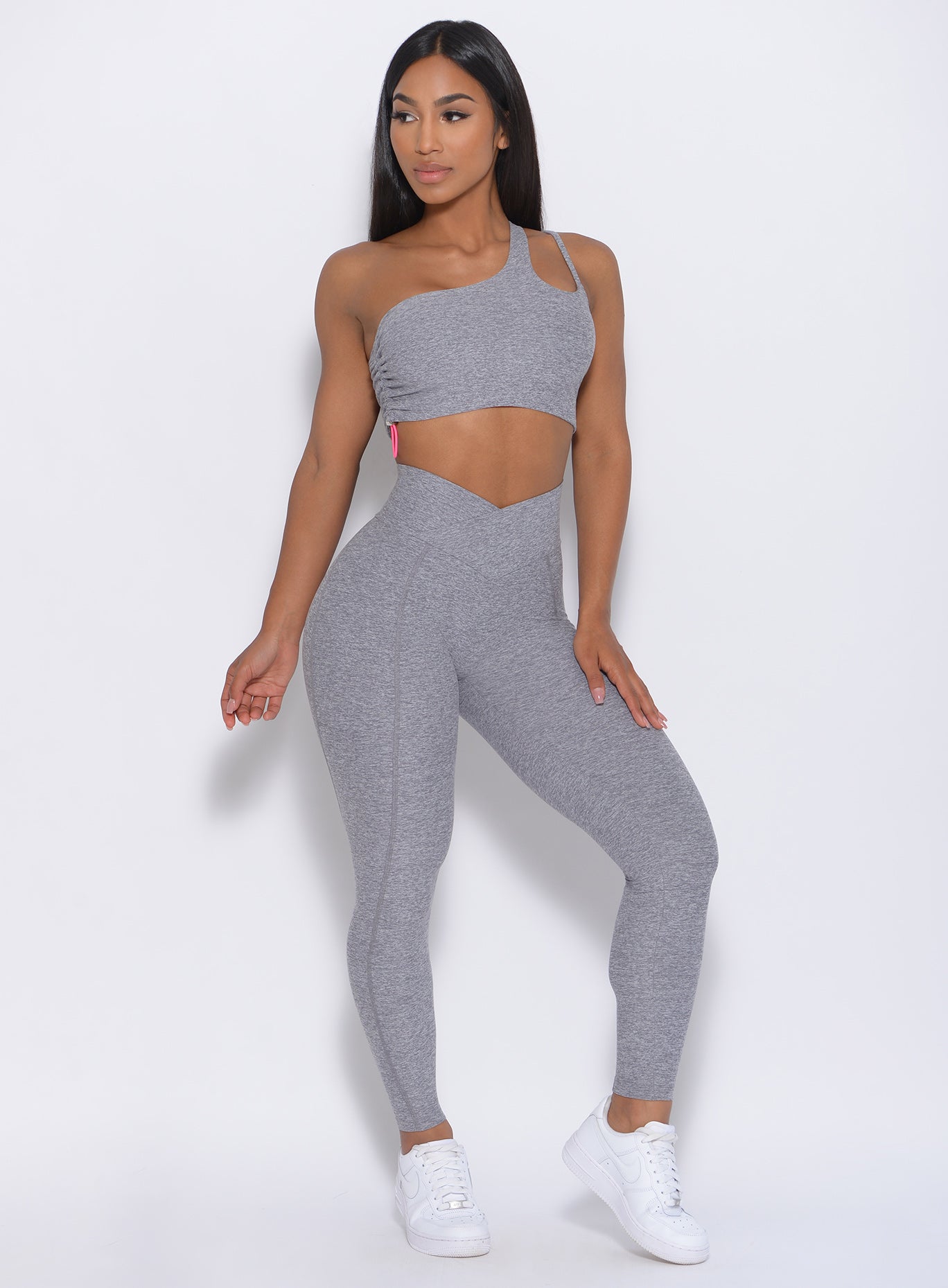 Front view of the model in our Brazilian Contour Legging in cloud color and a matching bra