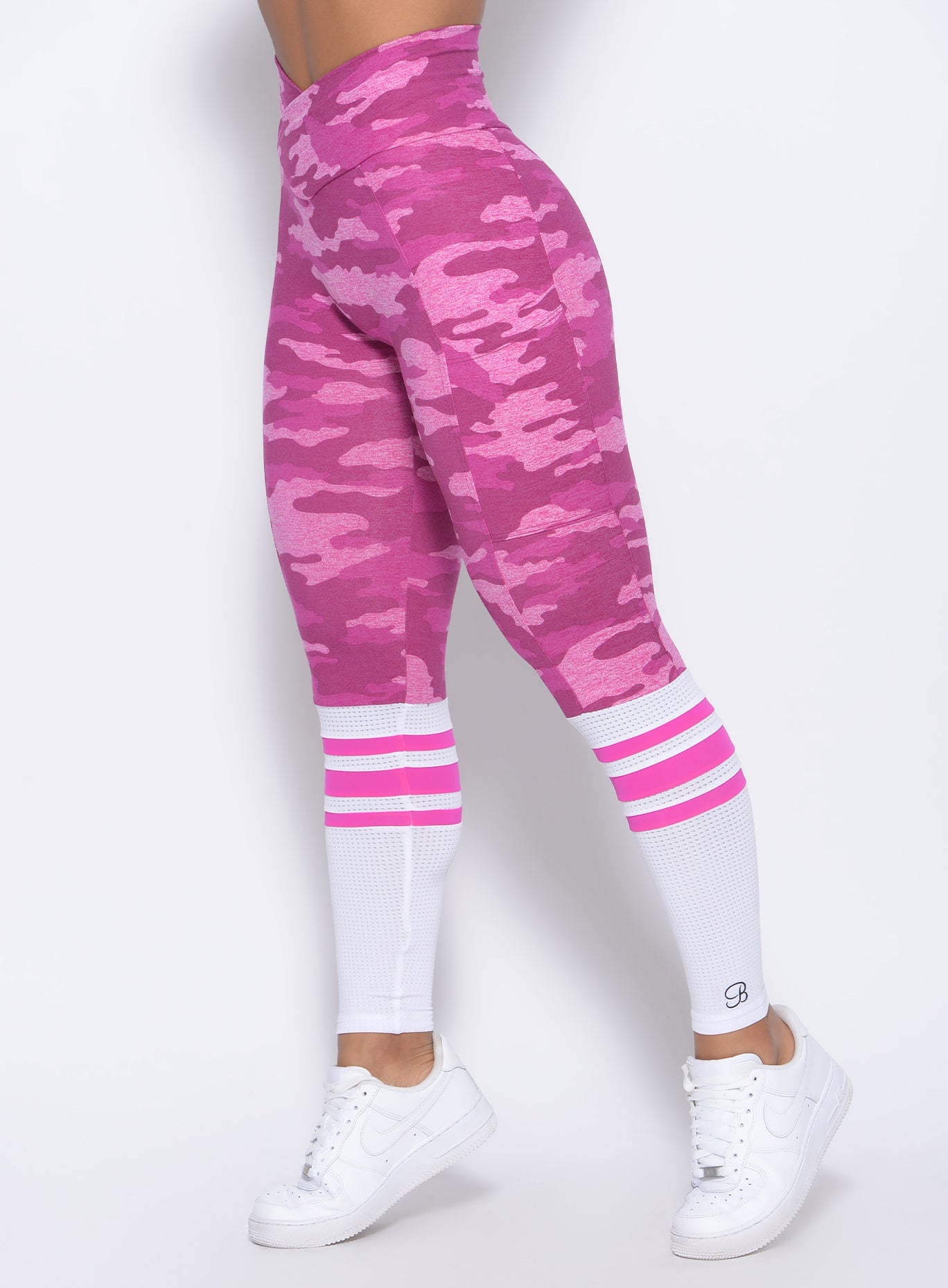 Zoomed in left side view of our pink camo contour sock leggings