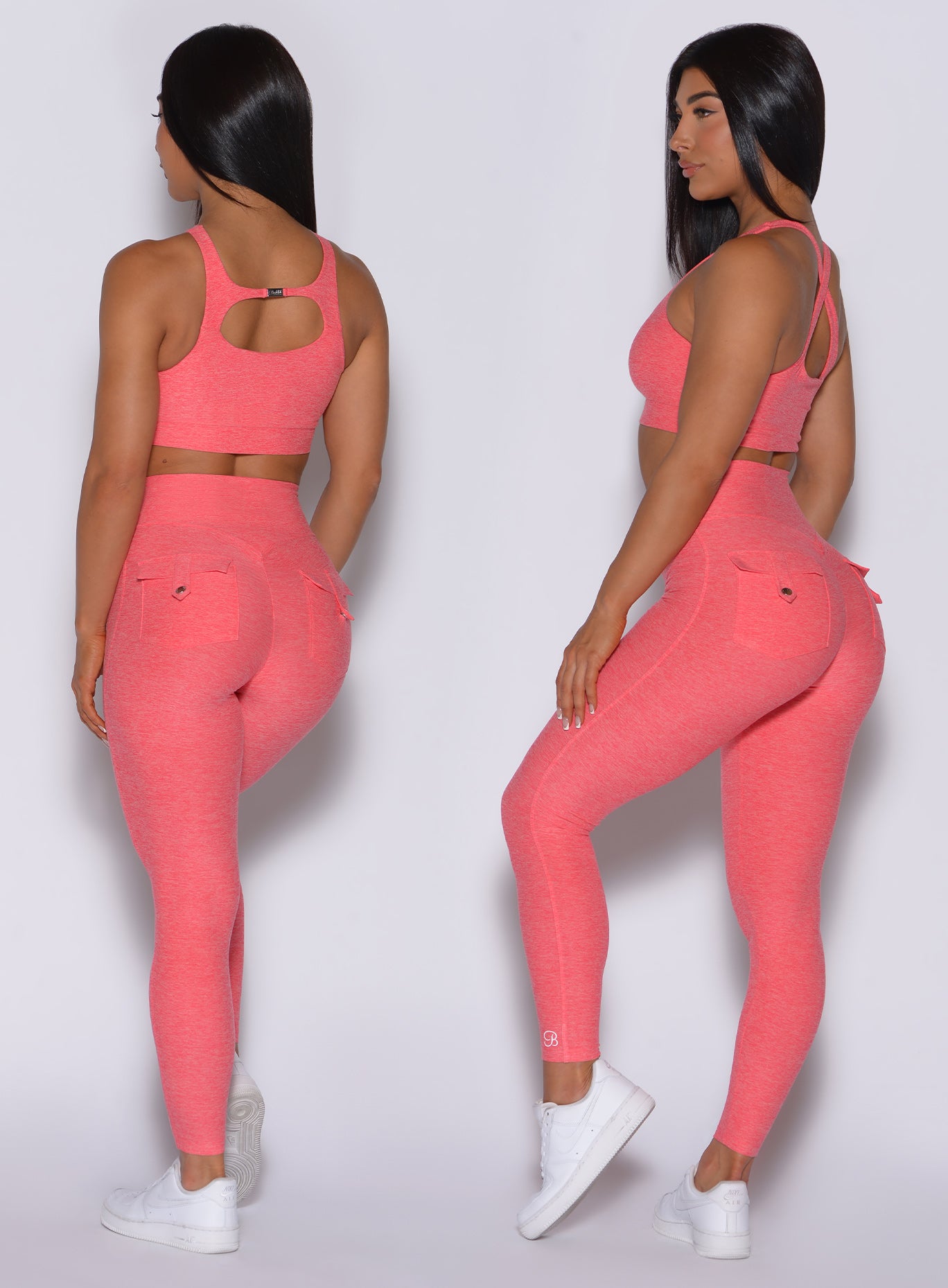 two back profile pictures of a model showing off our pocket rib leggings and a two way bra in papaya color
